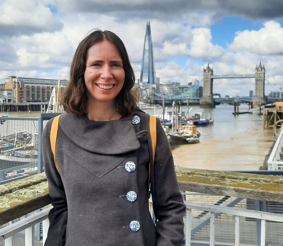 Photo of Katherine Jones Standing In Front of Tower Bridge, London